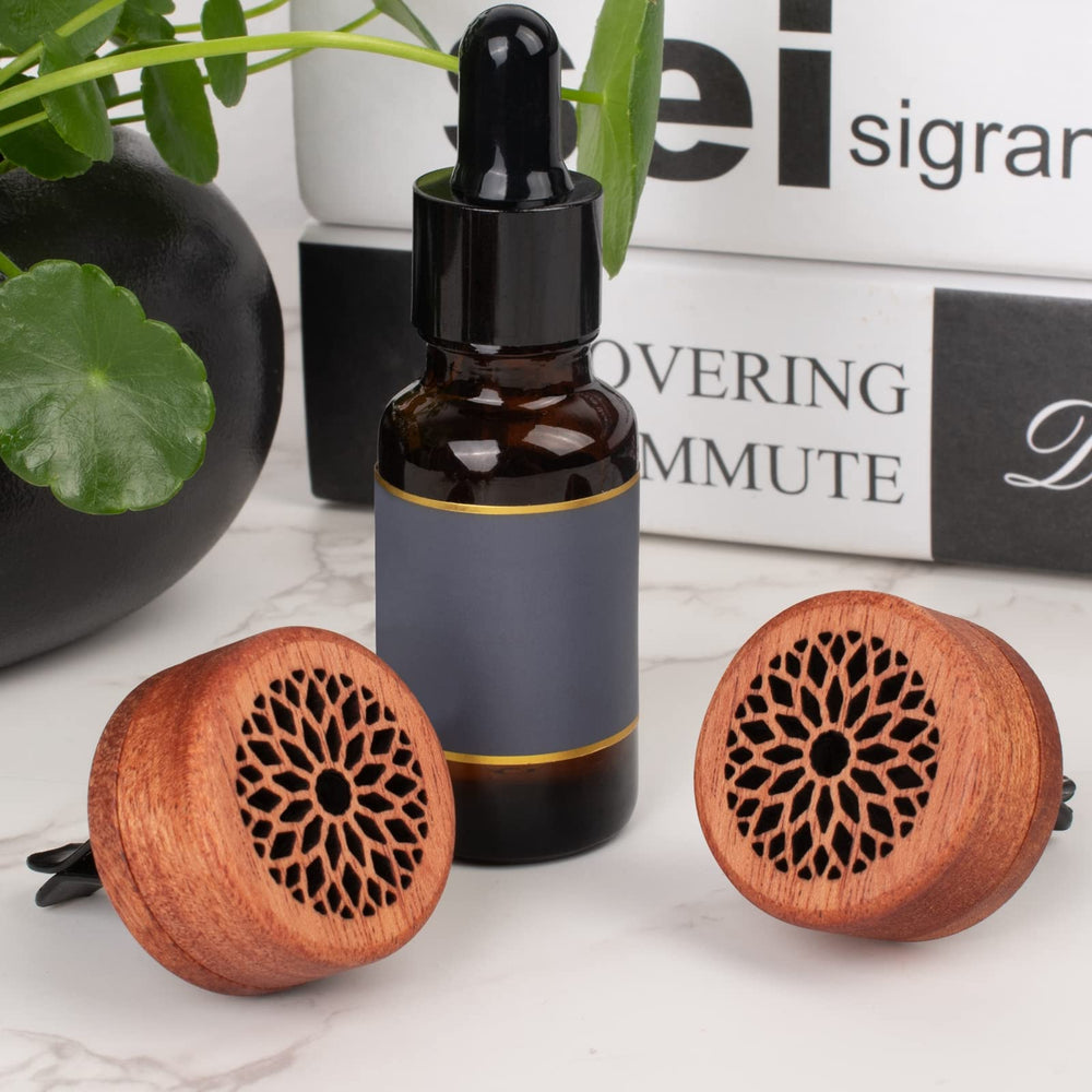 Close-up of rosewood grain and lava stones in diffuser