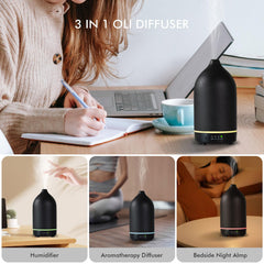 In-use shot of diffuser releasing mist in a room
