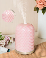 Pink ceramic essential oil diffuser with gold base