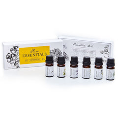 Diffuser-ready set of essential oils with dark bottles protecting the oils