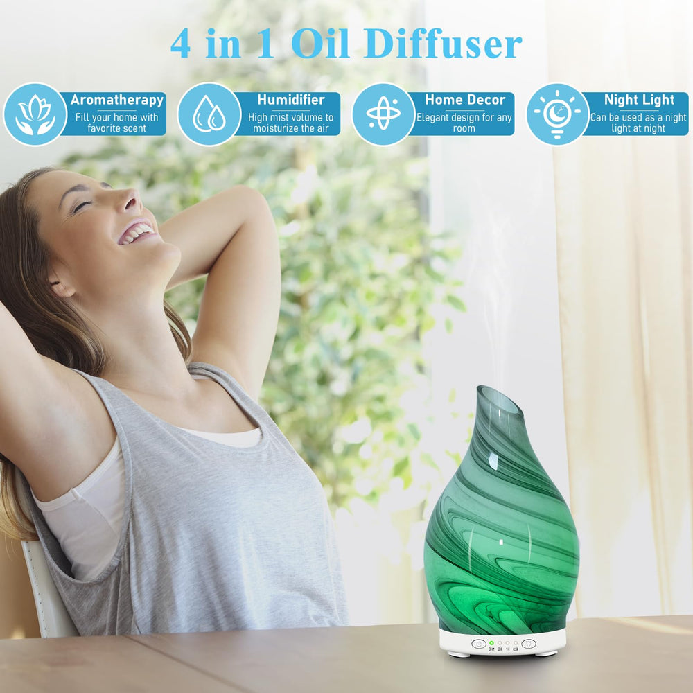 Glass essential oil diffuser displaying fixed LED color options