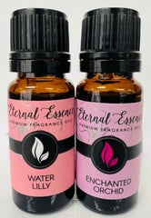 Enchanted Orchid and Water Lily fragrance oil bottles side by side