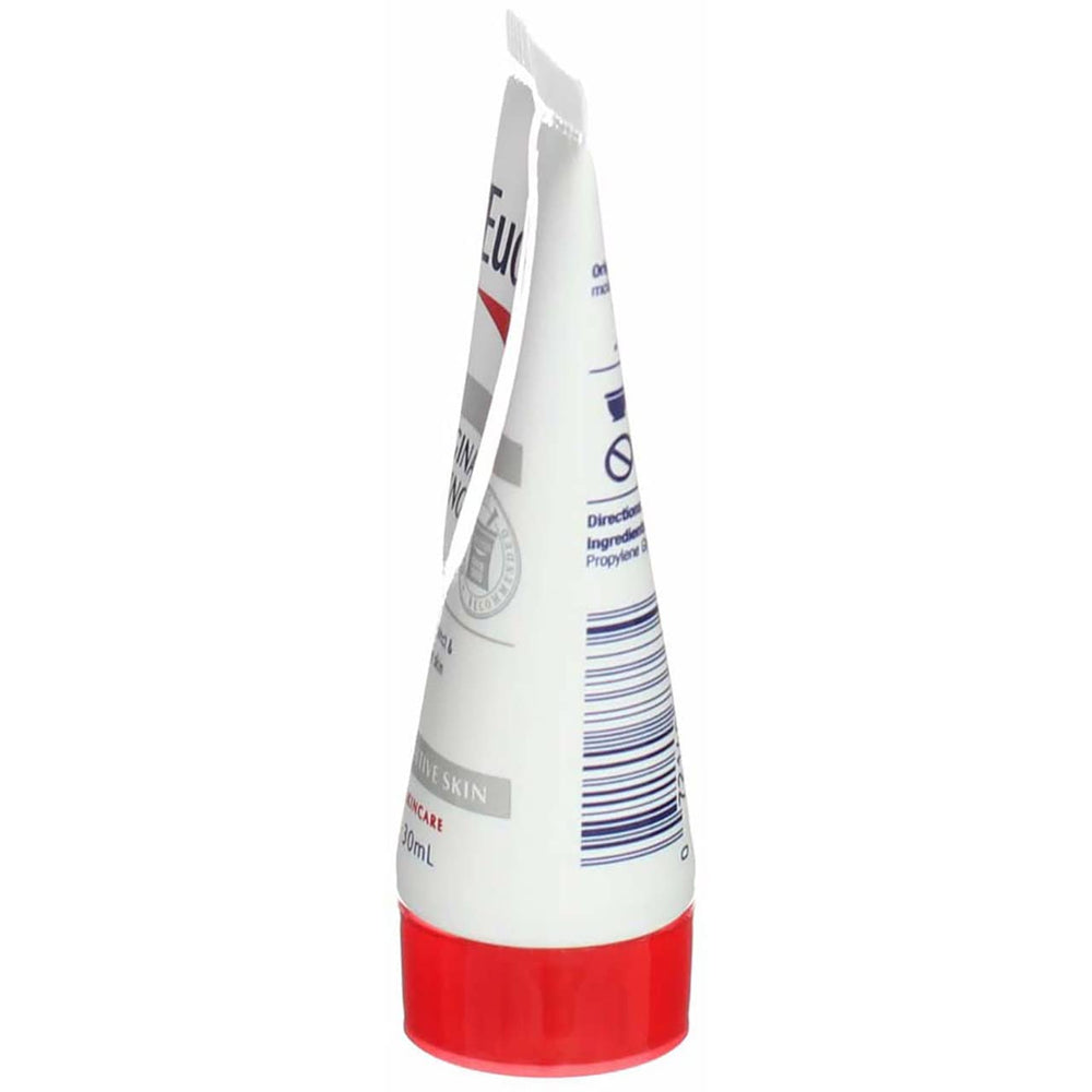 Hand applying Eucerin lotion for daily dry skin care