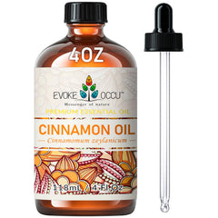 Amber glass bottle of EVOKE OCCU Cinnamon Essential Oil with dropper (4 oz).