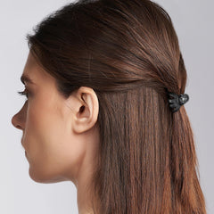 Expressions mini octopus clips on hair closeup for effortless chic updos.