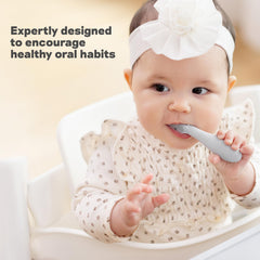 Baby using ezpz Baby-Led Toothbrush Pewter