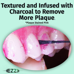 Charcoal-infused floss providing improved grip