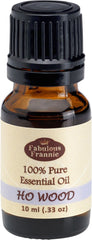 Fabulous Frannie Ho Wood essential oil bottle in amber glass ideal for diffusing aroma.