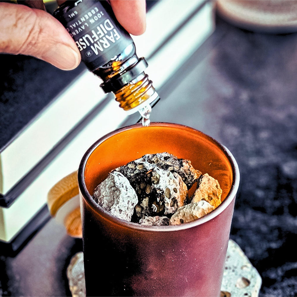 Farm to Diffuser frosted amber vessel on desk for subtle office fragrance