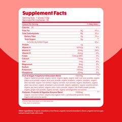Serving suggestion with glass and scoop of Superfood Reds powder