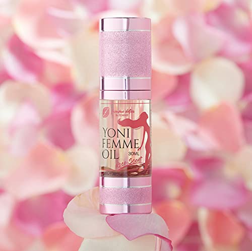 Applying Femme Detox Yoni Oil to the feminine area