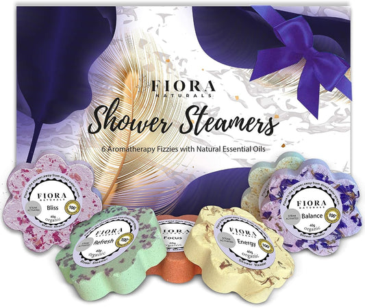Fiora Naturals Shower Bombs set on bathroom shelf for a relaxing spa ritual.