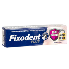 Close-up of Fixodent Denture Adhesive Cream squeeze tube