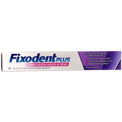 Applying a thin, even layer with Fixodent Plus adhesive