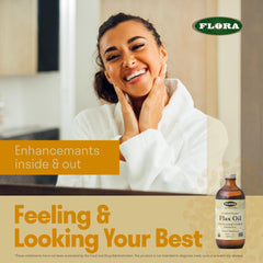 Flora flax oil 32-ounce amber bottle ready for daily use on a kitchen counter.
