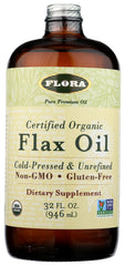 Flora Flax Oil in amber glass bottle 32 oz on kitchen counter