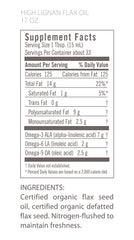 Close-up of Flora Health flaxseed oil bottle showing cold-pressed, unrefined oil