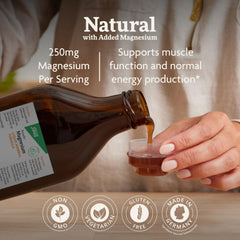 Pouring Floradix Magnesium liquid into a glass