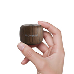 Flowtune wood grain design on a compact travel-ready sound machine
