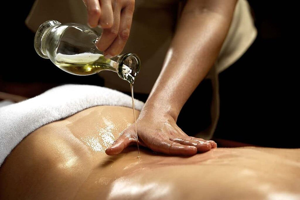 Close-up label reading Nature's Note Organics Frankincense & Myrrh essential oil.