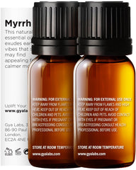 Close-up of Frankincense & Myrrh essential oil bottles from the duo pack
