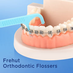 Close-up of Frehut orthodontic floss pick thin prong and tail hook