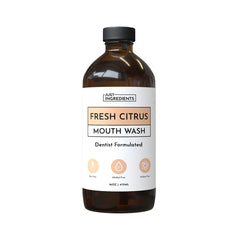 Bottle of Fresh Citrus Remineralizing Mouthwash with citrus flavor label