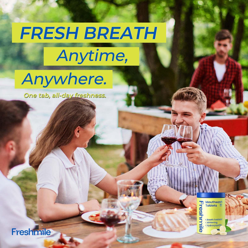 Hands holding Freshmile travel mouthwash tablets for on-the-go use