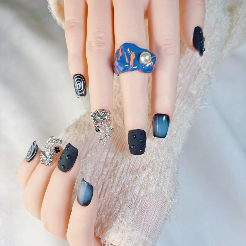 FURNUNUBI black 3D spiral nails deliver durable wear for everyday styling.