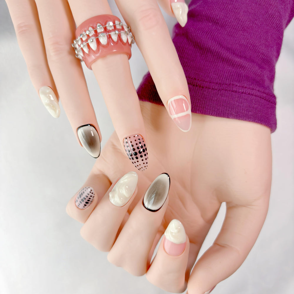 FURNUNUBI geometric ombre nails with subtle dots for chic depth