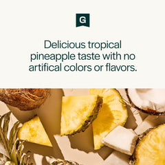Close-up of vibrant green greens powder with Tropical Pineapple branding