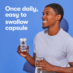 Open capsule contents poured into a glass of water