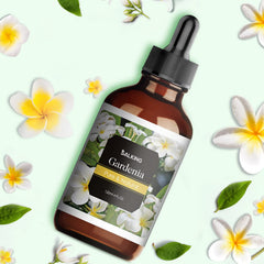 Close-up of Gardenia essential oil in amber bottle