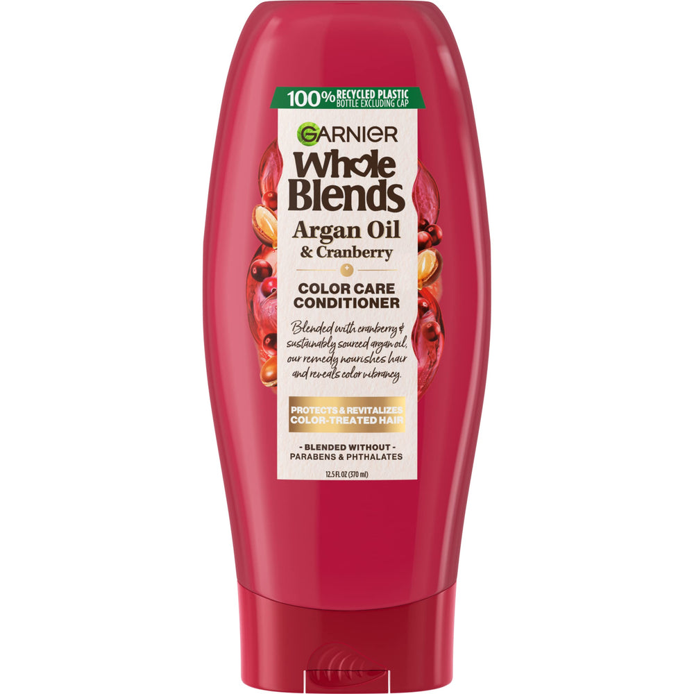 Garnier Whole Blends conditioner bottle with argan oil for color protection and shine.