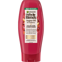 Garnier Whole Blends conditioner bottle with argan oil for color protection and shine.