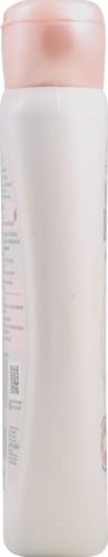 Garnier Whole Blends Gentle Shampoo Oat Delicacy pump bottle on bathroom counter
