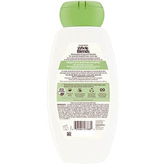 Garnier Whole Blends bottle tilted to show weightless moisture