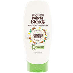 Garnier Whole Blends almond milk bottle front highlights weightless moisture for normal to dry hair.