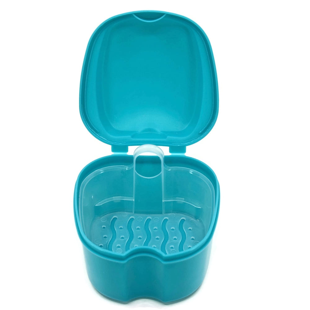 Teal denture case with lid open and draining tray for drying