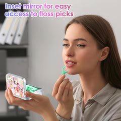 Travel-friendly compact dental floss organizer in pink flower design