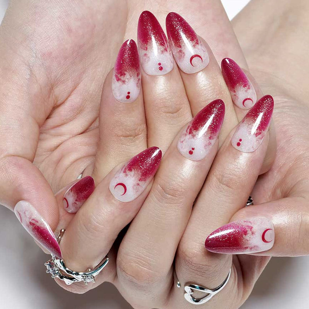 GLAMERMAID gothic moon short stiletto nails with UV gel finish.