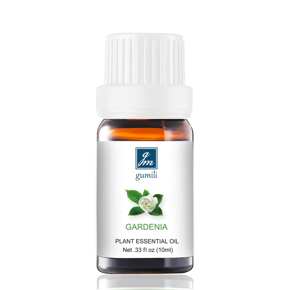 Close-up of Gardenia essential oil bottle with amber glass and inner dropper