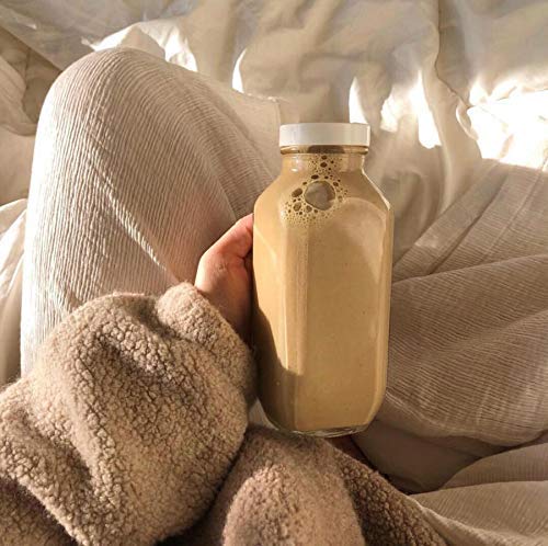Prepared latte in a mug with warm spices