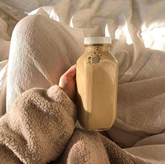 Prepared latte in a mug with warm spices
