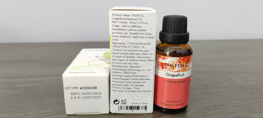 Amber glass bottle protecting Grapefruit Essential Oil from light