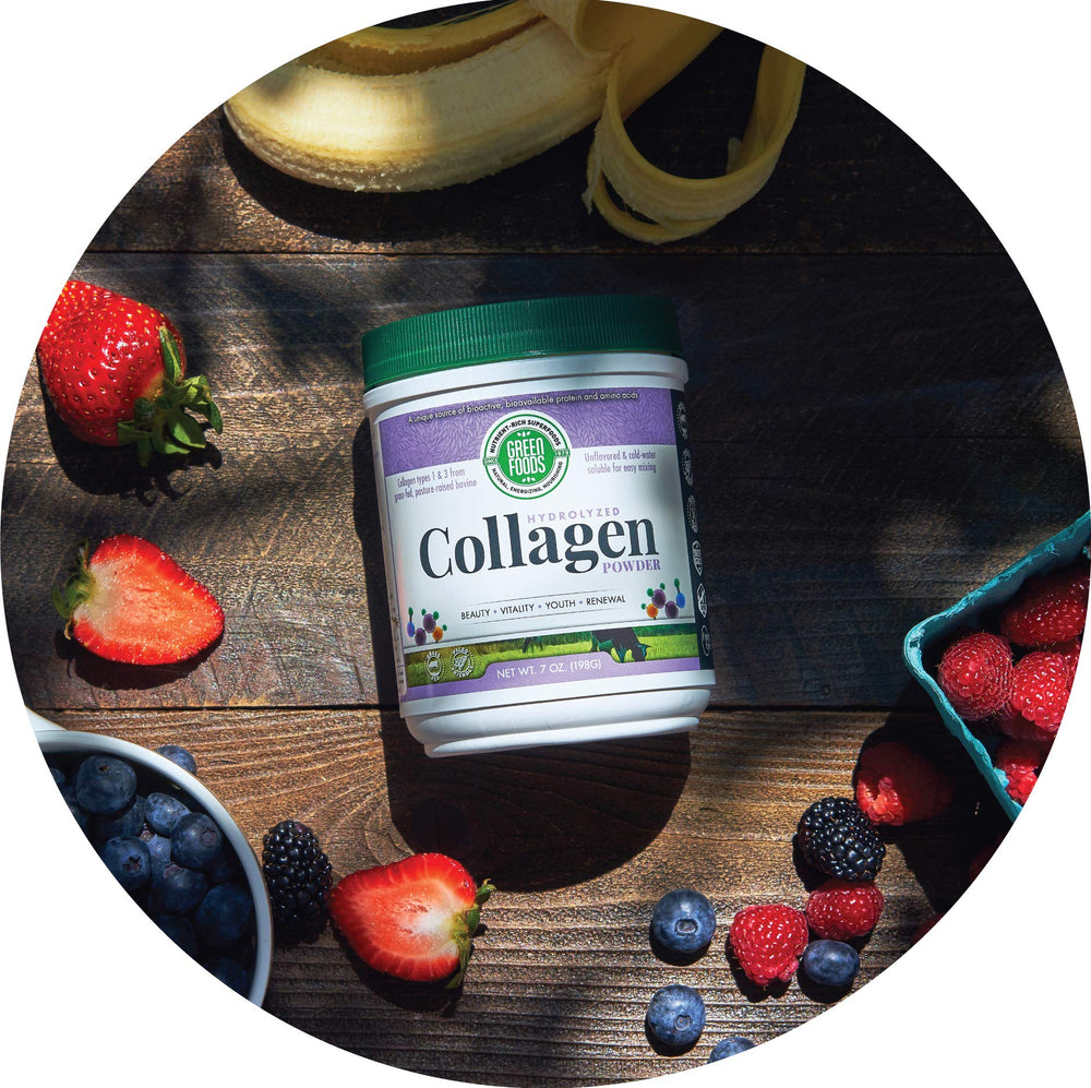 Scoop of collagen powder with measuring spoon