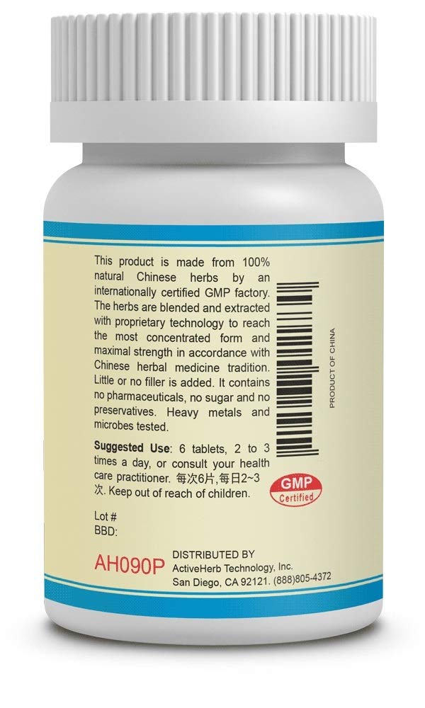 Shen Tong Zhu Yu Pian tablets and bottle close-up