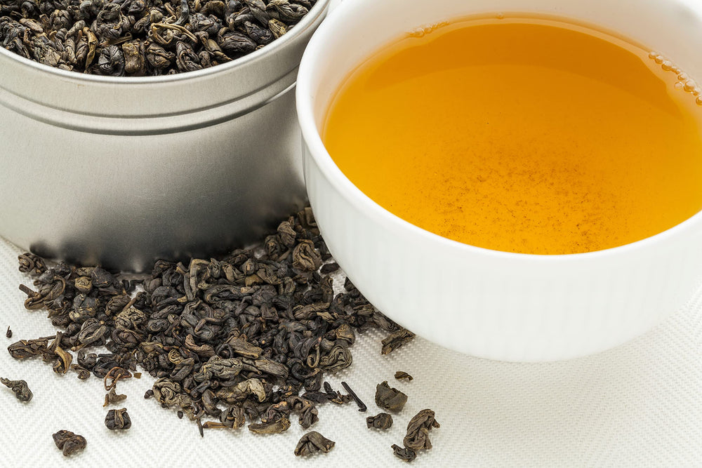 Cup of freshly steeped gunpowder green tea