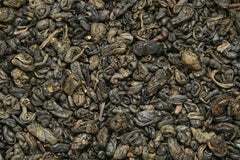 Brewing gunpowder green tea in a teapot