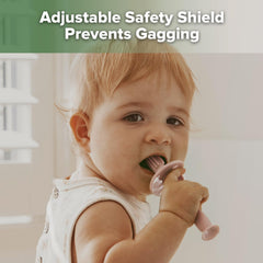 Adjustable choke-free safety shield on the toothbrush